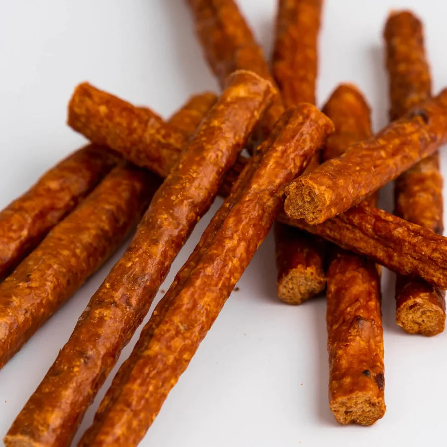 Close-up of slow-cooked sausage chews